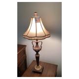 Matching pair of heavy lamps 39 inches tall,