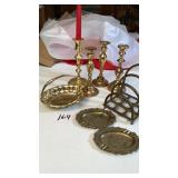 Brass candlesticks, ashtrays, letter caddy, dish