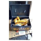 DeWalt metal box containing 5 3/8 saw and light,