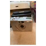 Canon PowerShot, S 10 digital camera, also a book