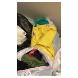 Six bags of clothes some new, shirts, pants,