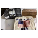 Two storage cases, and a New York USA tote shack