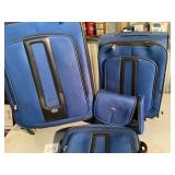 Four-Piece American Tourister Luggage Set