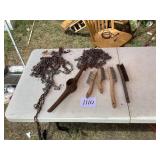 Tire Chains, Pick Axe Head, and Brushes