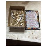 Gold-Toned Flatware Set and Decorative Sign