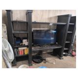 Gigantic Entertainment Center With TV