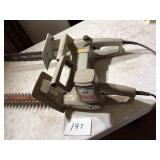 Craftsman 16' Trimmer and 14' Chainsaw