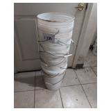 Stack of Five-Gallon Plastic Buckets