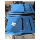 Two Blue Softside Suitcases