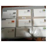 Sealed first day of issue stamps and envelopes
