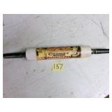Black handled wooden rolling pin