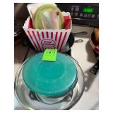 Glass bowls, popcorn, bucket, popcorn maker, and cast-iron skillet