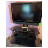 Insignia television on stand