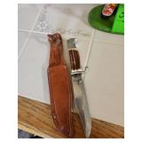 Hunting knife in sheath