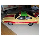 vintage 1970s LaTrax Ford Mustang II Cobra remote-controlled car.
