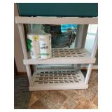 Plastic stackable shelves, three rolls of paper towels