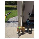 Plano double action tackle box and fishing poles