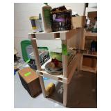 Small plastic shelf with contents