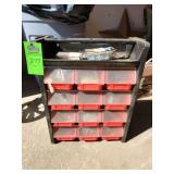 Tool storage bin with drawers and its contents