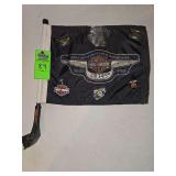 Harley-Davidson flag, lapel pins, Keychain, and police belt buckle
