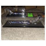 1999 diecast model of a Larry Dixon Miller Lite Harley-Davidson Top Fuel Dragster.  Large and mini version in display cases
