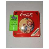 Vintage coca-cola tin with handkerchiefs