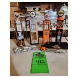 Harley Davidson gas pumps, train, tractor trailer