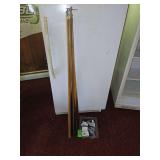 Pool cues and box of chalk