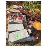Cinder blocks, bricks, miscellaneous items