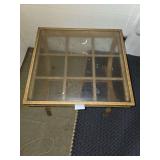Glass topped side table