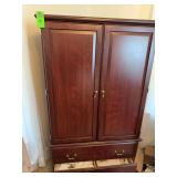 Armoire with blankets