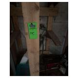 Set a golf clubs, hand tools, saws files, two extension cords, several different cushions for outdoor furniture, miscellaneous bug sprays plastic baskets