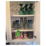 Entire cabinet of wine, glasses, champagne, glasses, coffee, mugs, water, glasses
