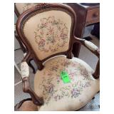 Antique wooden chairs with fabric covering