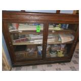 Antique vitrine with glass sliding doors