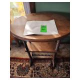 two-tier oval wood end table with spindle legs
