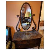 antique oak dresser with a swivel mirror.