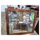 Framed mirror about 29 in X 25 in