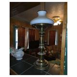 vintage brass table lamp with a milk glass shade.