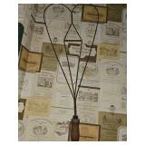 Vintage rug beater and heat diffuser