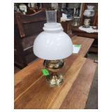 vintage brass oil lamp that has been converted to electricity.