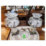 vintage "Gone With the Wind" style electrified oil lamp with a brass base and a frosted glass shade featuring an etched floral design. Set of 2