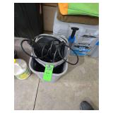 Trash can bucket and extension cord