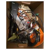 Variety of miscellaneous items, cords, headphones, etc