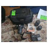 Canon EOS Rebel T1i camera eith carrying case and lenses