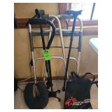 Three canes a walker and other miscellaneous items