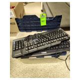 2 keyboards and miscellaneous cords