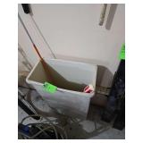 Trash can and yard stakes