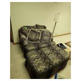 patterned chair and a half with a matching ottoman