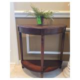 Half moon entry table with small plant